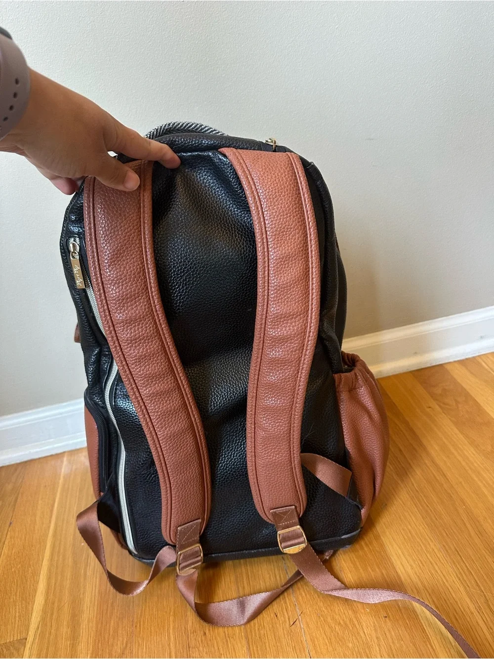 Itzy Ritzy Herringbone Baby Backpack in Black, White & Brown